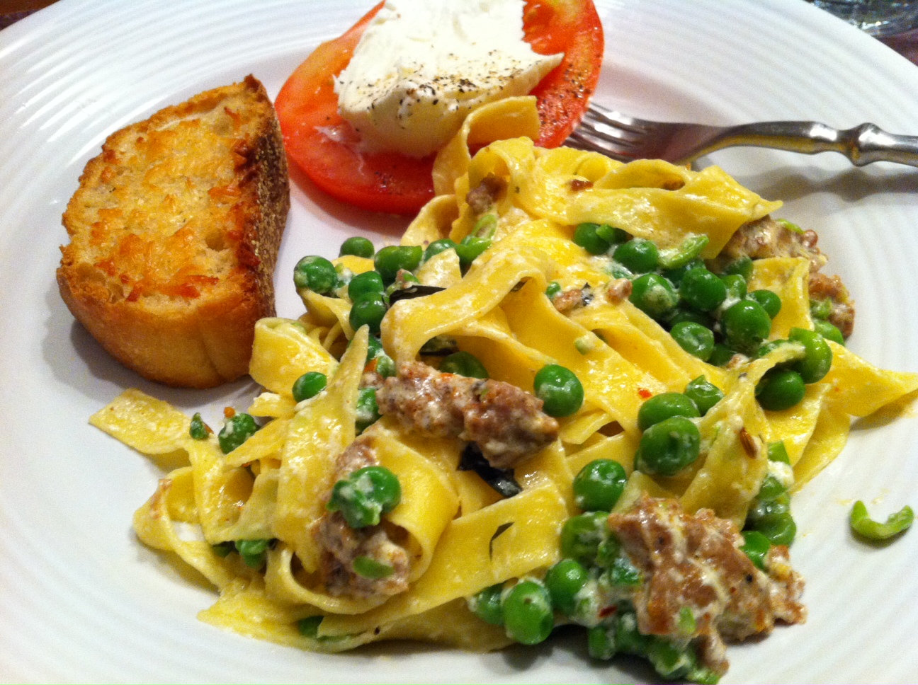 Ali Eats Tagliatelle with Smashed Peas, Sausage and Ricotta