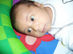 Hanging out on his Baby Einstein mat