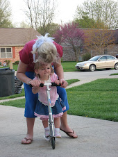 Learning to ride Jolies scooter!