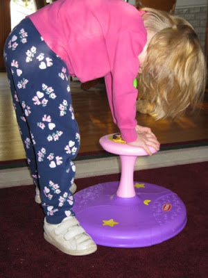 Bending Over the Sit N' Spin