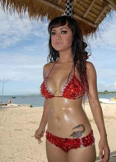 Julia Perez in red bikini and tattoo