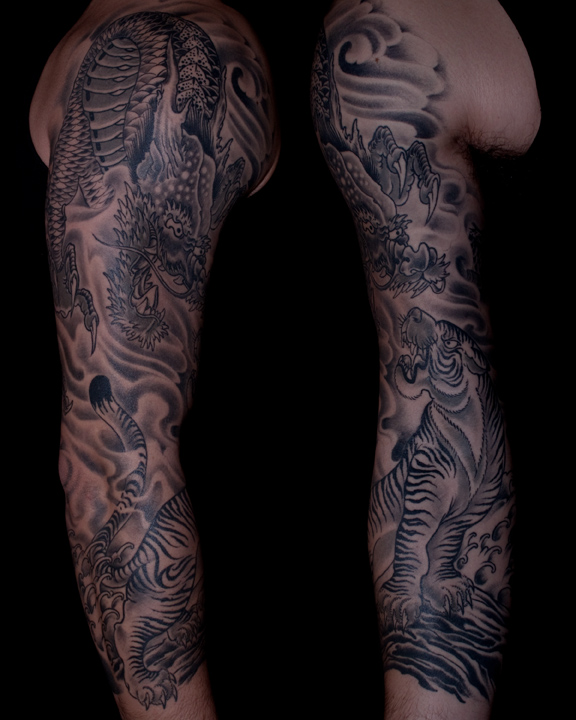 Some new tattoos This dragon tiger sleeve is a healed photo