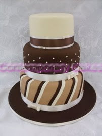 Caramel chocolate and candy stripe 3 tier stacked cake.