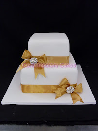 Diamonte tied bows,2 tiered stacked cake.