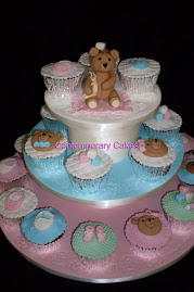 Baby shower Cupcakes with sugar paste modelled teddy bear.