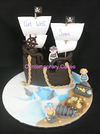 Pirate cake with cheeky pirates! Sun.11th April