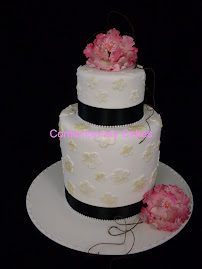 Extended tier cake with sugar peony roses.