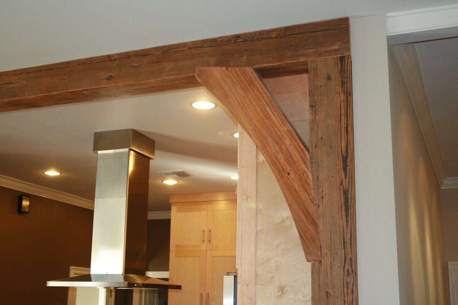Revival Timberworks long leaf pine beams and mantel