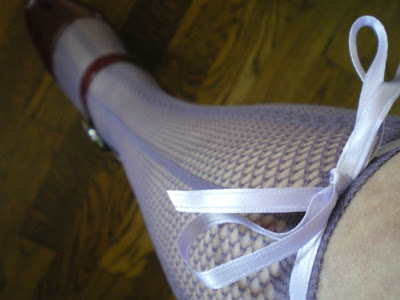 purple fishnet knee socks with ribbons