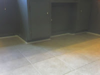 new bath tile laid over old bath tile