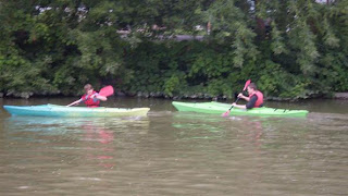 two boys in rented kayaks Erie Canal Fairport NY