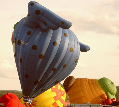 Dansville Balloon Fest purple-winged balloon aloft