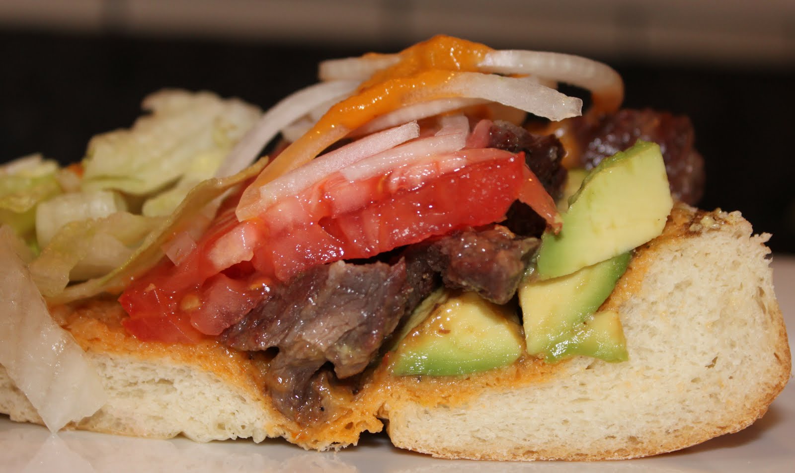 Kitchen Snaps Skirt Steak Sandwich with Sofrito, Tomato, Avocado and Onion