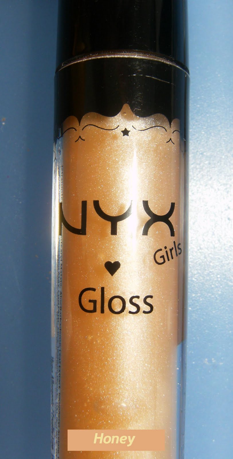 4.bp.blogspot.com/_Peq9eqwhsSg/TA6iUZbG-_I/AAAAAAAAAXo/6rzO63lDfjk/s1600/NYX+Lip+Gloss+Honey.JPG