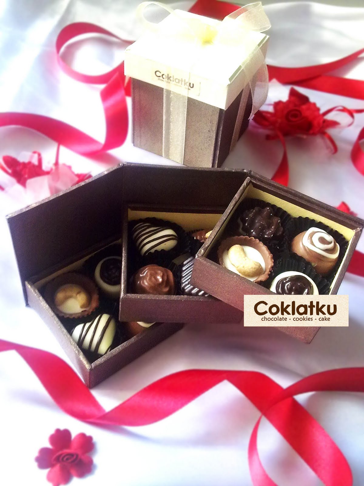 coklatku chocoshop assorted chocolate on a stacking boxes coklatku chocoshop assorted chocolate on a stacking boxes
