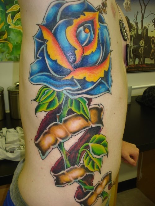 Best Flower Tattoo Design For Girls On The Side Body