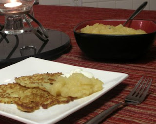 Delicious potato latkes, traditional for Hanukkah, celebrated here, yes, with the lighting of the Advent candle