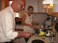 My brother Bob and niece Jessie cooking...Bob is trying to flip the omelet.