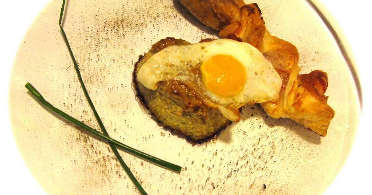 Flan of asparagus with quail eggs bread stick with bacon