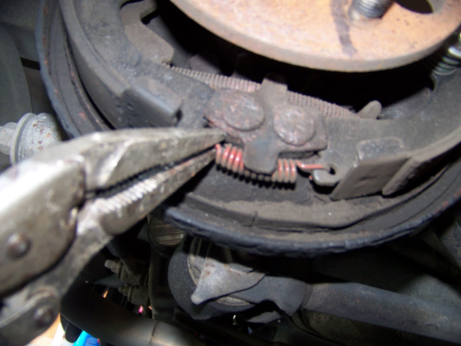 The best way to remove your brake shoes is to start from the top removing the spring where the brake adjuster is through it then you can work your way ...
