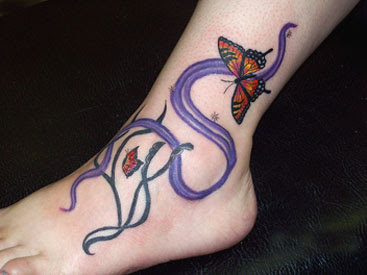 image of butterfly feet tattoo
