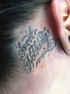 cursive tattoo on neck cursive tattoo design