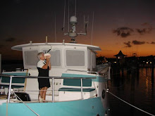 Sue blowing the conch horn