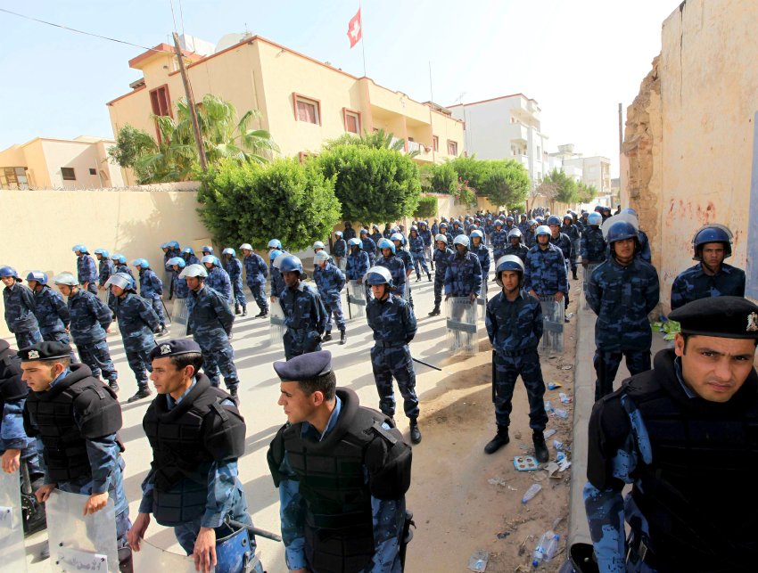 Libyan security forces guard