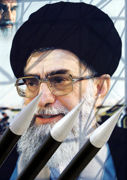 عاجل عاجل : كوريا الشمالية تطلق صاروخا نوويا على كوريا الجنوبية و أمريكا. Russian-made+Sam-6+surface-to-air+missiles+are+seen+in+front+of+a+portrait+of+Iran's+Supreme+Leader+Ayatollah+Ali+Khamenei+at+a+war+exhibition