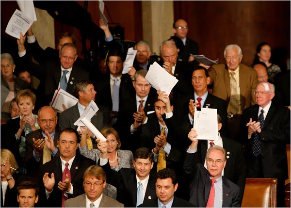 [GOP+members+hold+up+their+own+health+care+plan.JPG]