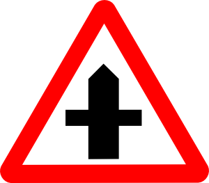 At a crossroads sign At a crossroads sign