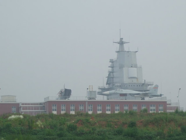 Chinese Aegis and J -15, Wuhan aircraft carrier decorated very fast