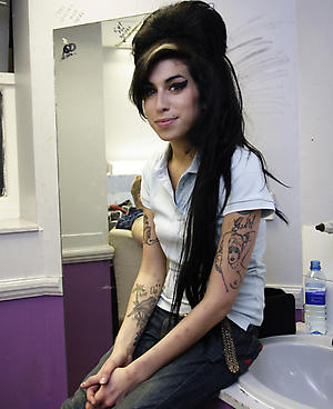 http://besttattooworld1.blogspot.com/2009/08/emo-girl-with-tattoos.html