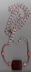 red + white beaded necklace