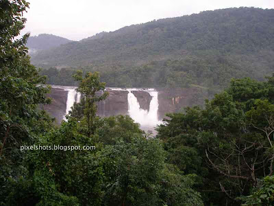 athirapally-waterfalls-of-kerala,distant-view-of-athirapilly-river-falls,indian-niagrs,7-wonders-of-kerala,three-streams-of-athirapally-waterfalls