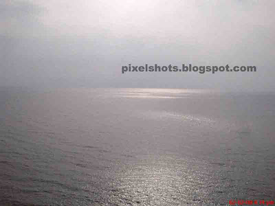 Calm Arabian sea of kovalam, Photo from top of Kovalam lighthouse calm sea of kovalam, photo from top of lighthouse, kerala ocean photos, calm arabian sea photos, sea photos from top of lighthouses