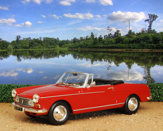Peugeot 404 Cabriolet (the model is a 1:43 by Minichamps). Peugeot 404 Cabriolet (the model is a 1:43 by Minichamps).
