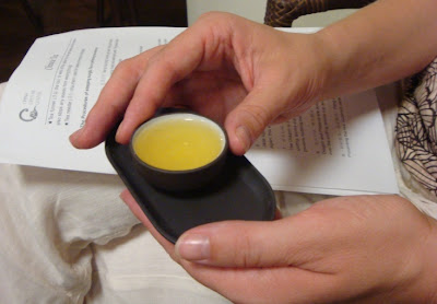 Sampling a drop of Chinese tea
