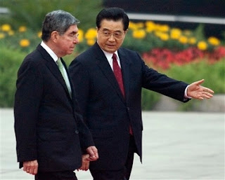 Costa Rica's President Oscar Arias, left, is shown the way by his Chinese counterpart Hu Jintao during the welcoming ceremony outside the Great Hall of the People in Beijing, China, Wednesday, Oct. 24, 2007. Oscar Arias was in the Chinese capital on Wednesday for talks with the country's leaders on his first visit since switching diplomatic ties from Taiwan. (AP Photo/Andy Wong)
