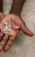 Several diamonds in the hands of a smuggler. Several diamonds in the hands of a smuggler.