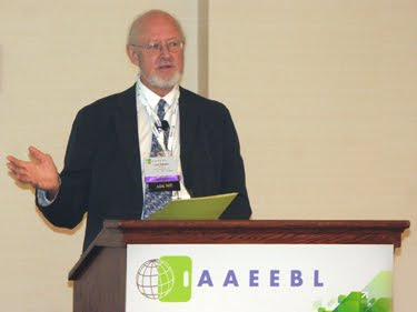 Photo: Trent Batson summing up the Conference