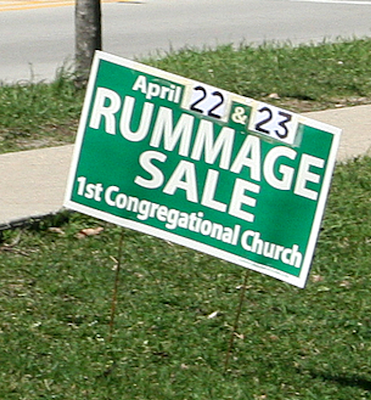 Now that the election is over, the Congregational Church is winning the sign 