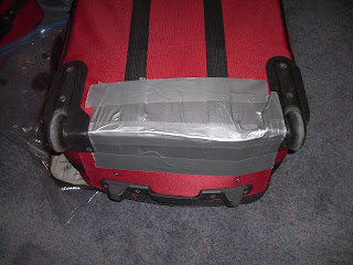 The crews at the Bucharest airport decided that if they can't have anything nice than no one can. Our ghetto suitcase prepped for Israel.