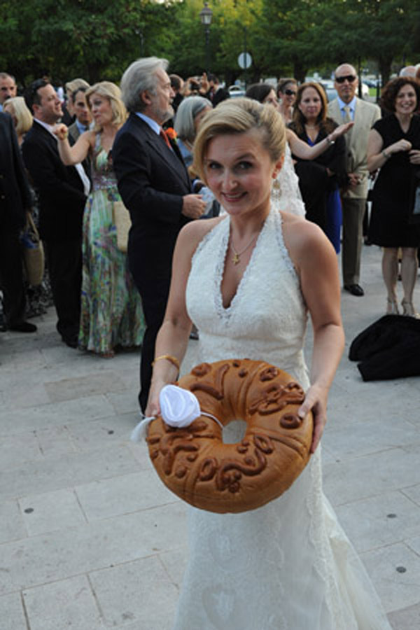 Here you see her at her wedding in Corfu Greece about to toss a decorated Here you see her at her wedding in Corfu Greece about to toss a decorated