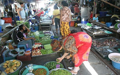 What train tracks? Where? IMAGE: Mae Klong Railway market covered