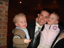 Pausing for a photo with my niece and nephew