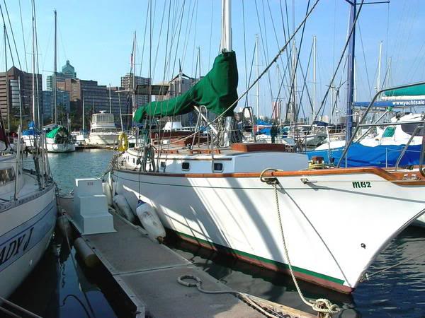 ... portholes, wooden trim, butterfly hatches, bowsprit and cutter rig! ... portholes, wooden trim, butterfly hatches, bowsprit and cutter rig!