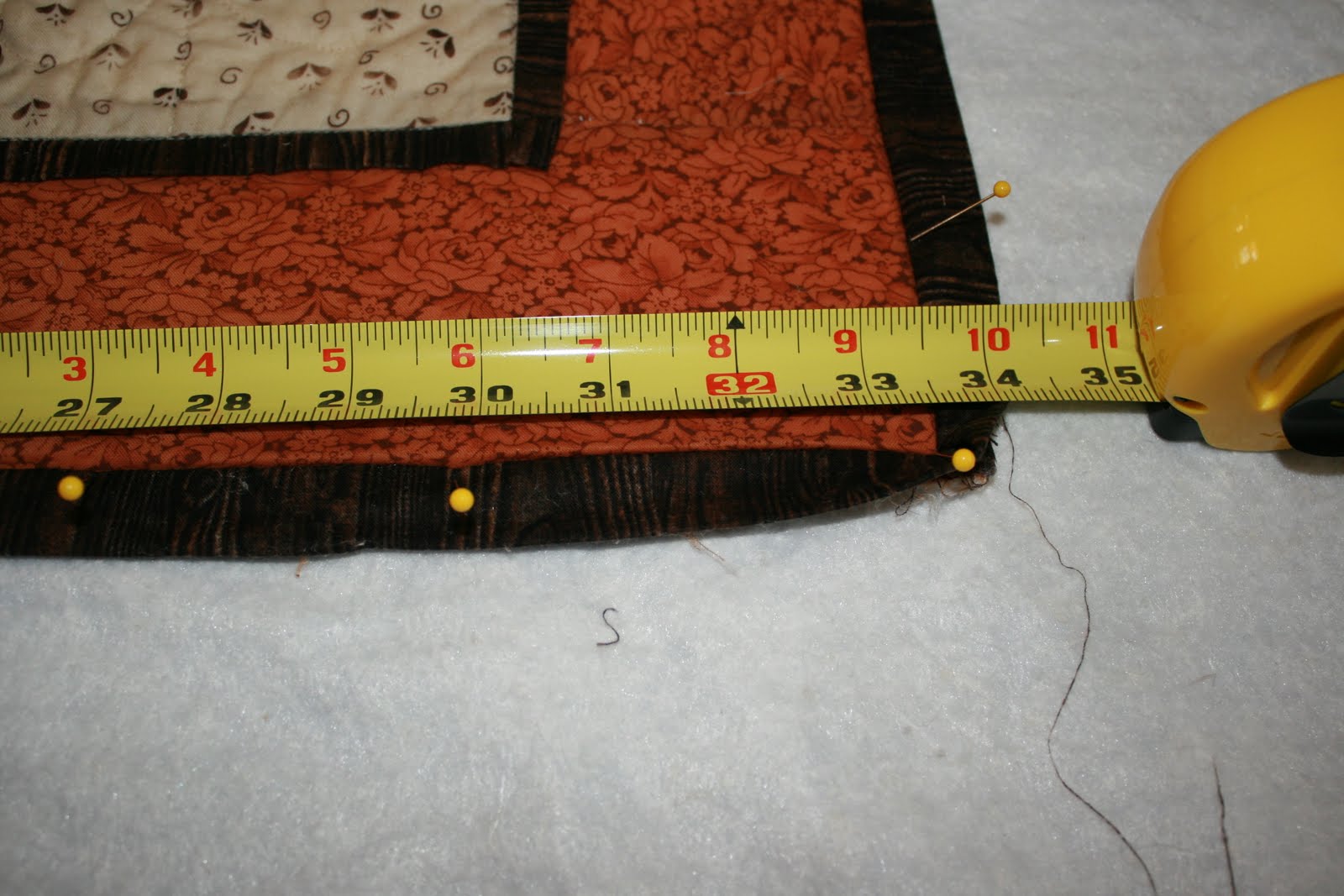 Buzzing and Bumbling Blocking a Quilt