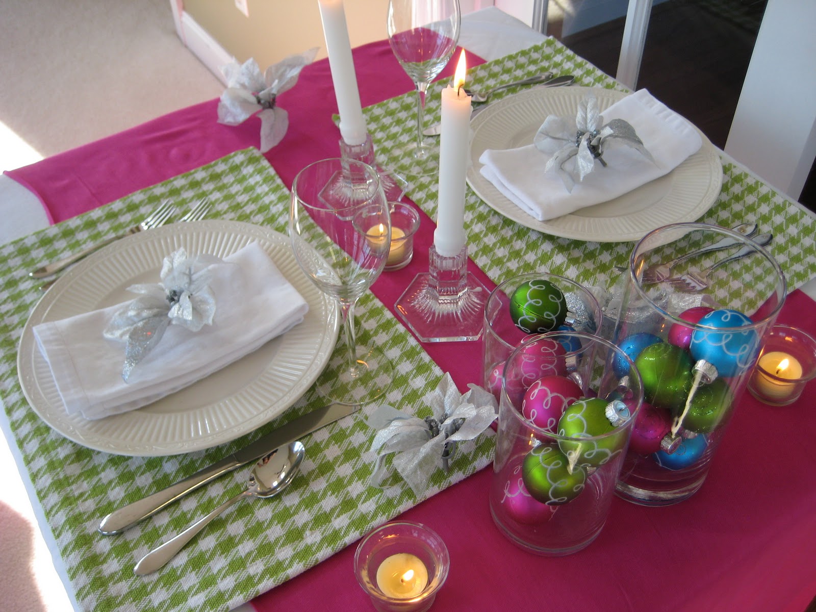 Pink and Green Christmas table setting with candles