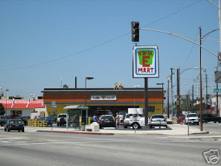 Simpsons Movie 7-Eleven Kwik E Mart takeover - store sign